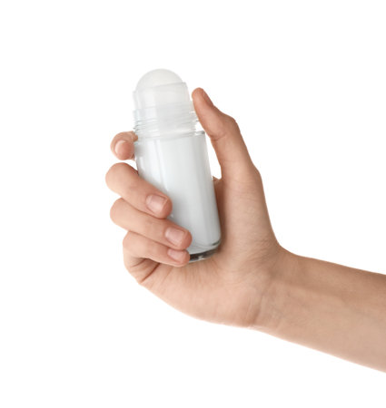 Woman holding roll-on deodorant on white background, closeupの写真素材