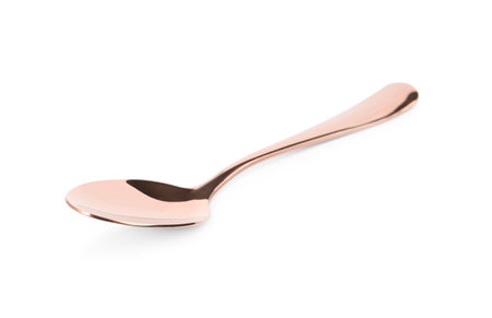 Clean shiny empty spoon isolated on whiteの写真素材