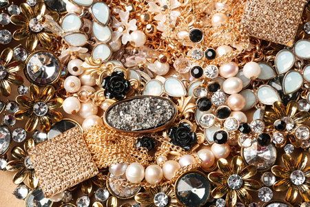 Different elegant jewelry as background, top viewの写真素材