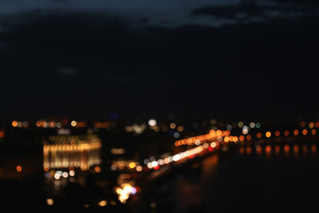 Blurred view of beautiful city at night. bokeh effect