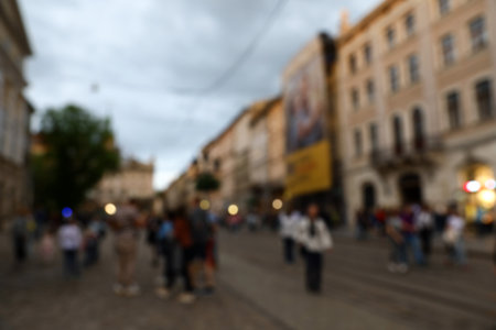 LVIV, UKRAINE - APRIL 27, 2019: People walking Market Square, blurred viewの写真素材