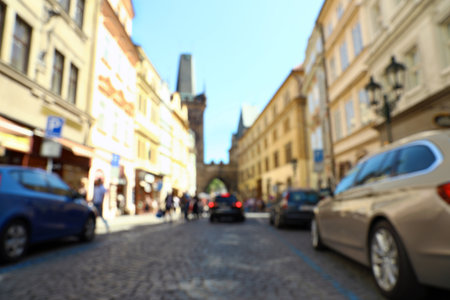 PRAGUE, CZECH REPUBLIC - Blurred view of city street with old buildingsの写真素材