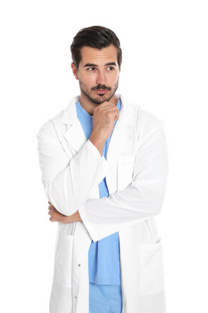 Young male doctor in uniform on white background. Medical serviceの写真素材