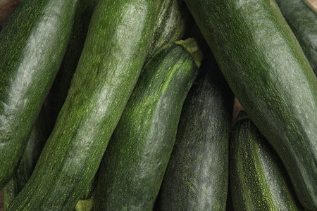 Top view of fresh ripe zucchini as background, closeupの写真素材