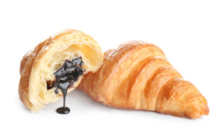 Tasty croissants with chocolate on white background. french pastryの写真素材