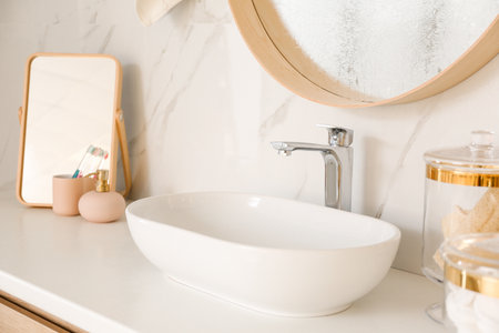 Stylish vessel sink under mirror in bathroom. interior elementの写真素材
