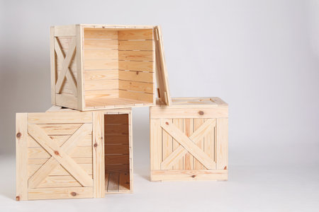 Wooden crates on gray background. Space for textの写真素材