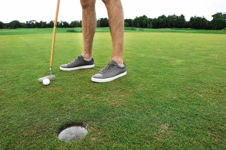 Man playing golf course. Sport and leisure