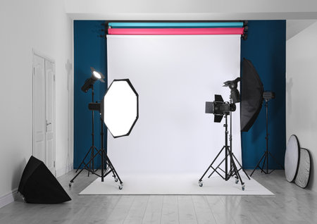 Photo studio interior with set of professional equipmentの写真素材
