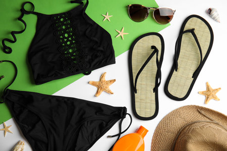 Flat lay composition with beach objects on color backgroundの写真素材