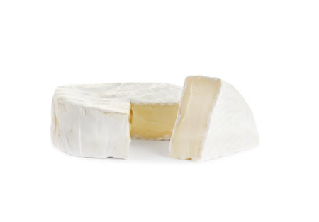 Tasty cut brie cheese isolated on whiteの写真素材