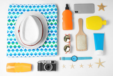 Beach accessories on white background, top viewの写真素材