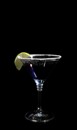Glass of delicious cocktail on black backgroundの写真素材