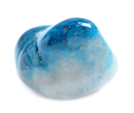 Beautiful blue shattuckite gemstone on white backgroundの写真素材
