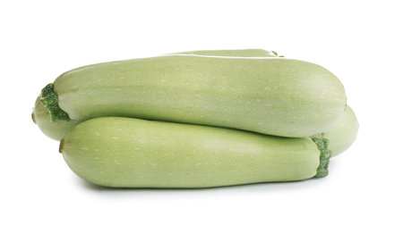Fresh ripe green zucchinis isolated on whiteの写真素材