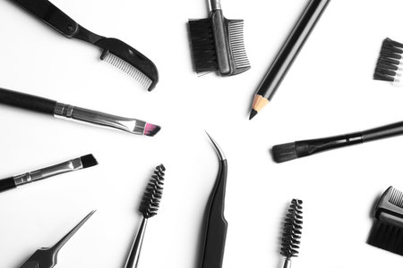 Set of professional eyebrow tools on white background, top viewの写真素材