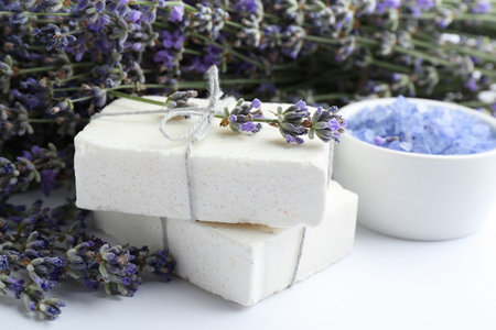 Hand made soap bars with lavender flowers on white backgroundの写真素材