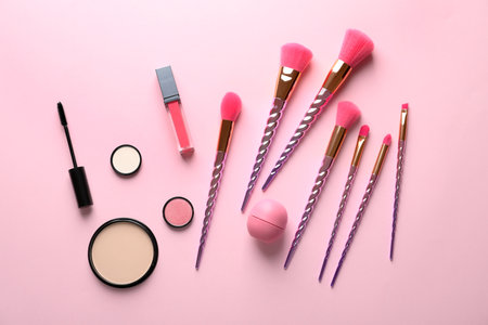 Flat lay composition with makeup brushes on pink backgroundの写真素材