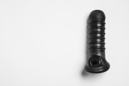 Black sex toy on white background, top viewの写真素材