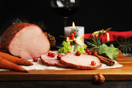 Delicious ham served on wooden board. christmas dinnerの写真素材