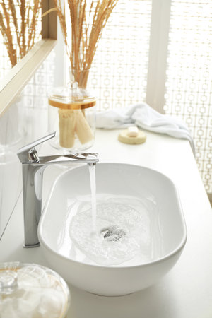 Stylish white sink in modern bathroom interiorの写真素材