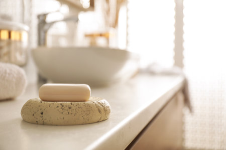Bar of soap on countertop in modern bathroom interiorの写真素材