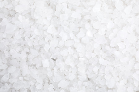 White sea salt as background, top view. spa treatmentの写真素材