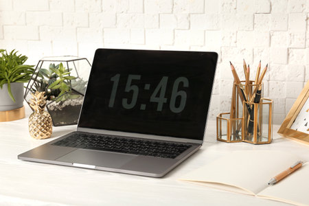 Stylish workplace with different golden accessories indoors. Idea for interior designの写真素材