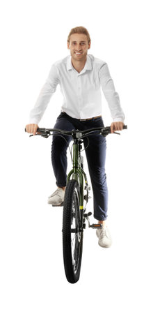 Happy young man riding bicycle on white backgroundの写真素材