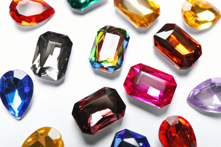 Different beautiful bright gemstones on white backgroundの写真素材