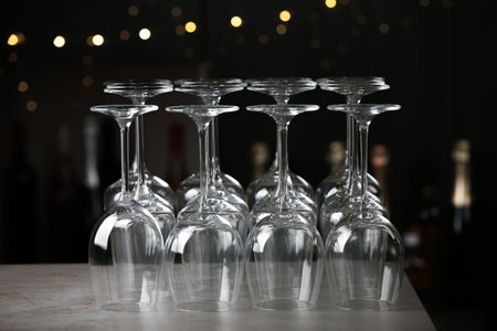 Empty clean glasses on counter in bar