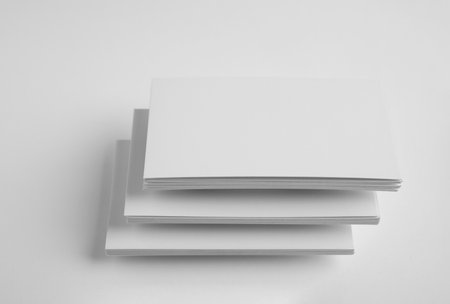 Blank business cards on white background. Mock up designの写真素材