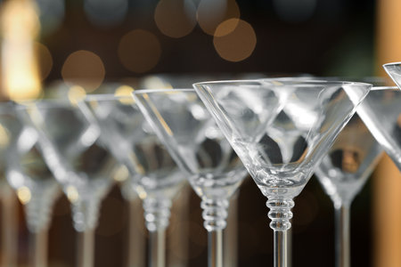 Empty martini glasses on blurred background, closeupの写真素材