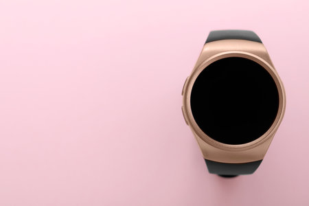 Trendy smart watch on pink background, top view. Space for textの写真素材