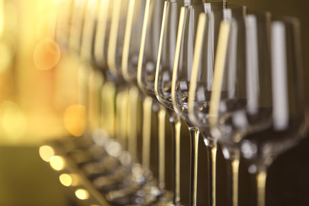 Empty clean glasses on counter in barの写真素材