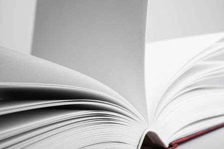 Close up view of open book on light backgroundの写真素材