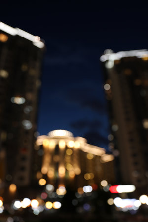 Blurred view of night cityscape with bokeh effect