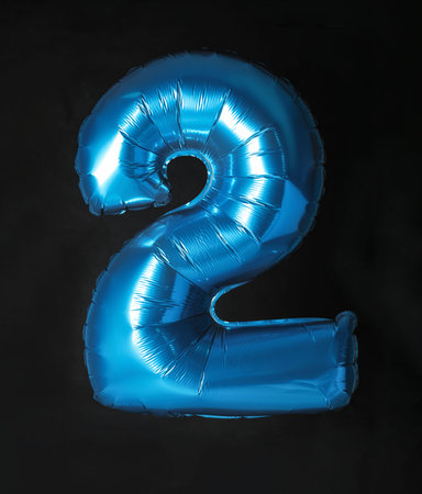 blue number two balloon on black background