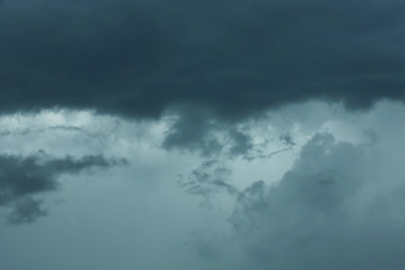 Sky with heavy rainy clouds on gray dayの写真素材