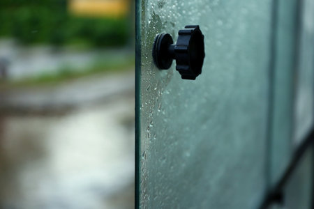 Open tram window with rain drops, closeup viewの写真素材
