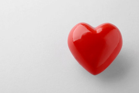 Shiny red heart on white background, top viewの写真素材