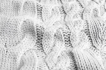 Gray knitted sweater as background, closeup viewの写真素材