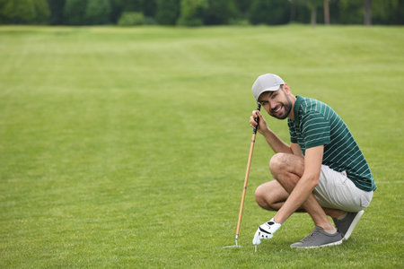 Man playing golf course. Space for text