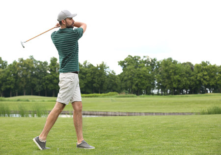 Man playing golf course. Sport and leisureの写真素材