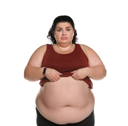 Emotional overweight woman posing on white backgroundの写真素材