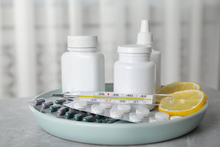 Different cold remedies on light gray marble tableの写真素材