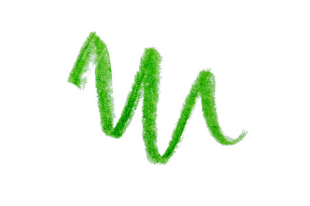Green pencil scribble on white background, top viewの写真素材