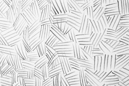 Abstract graphite pencil drawing on white backgroundの写真素材