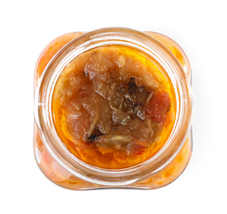 Open jar with pickled vegetables on white background, top viewの写真素材