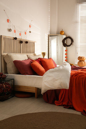 Cozy bedroom interior inspired by autumn colorsの写真素材